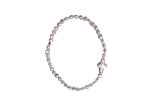 Pearl bracelet with a star-shaped clasp on a white background