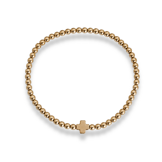 Gold beaded bracelet with square cross