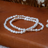 All Pearl Cross Bracelet