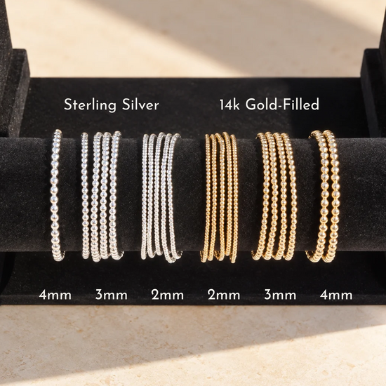 Beaded stacking bracelets in 14k gold filled or sterling silver, styled as a stack